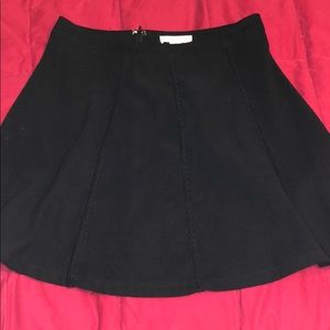 black mid thigh skirt